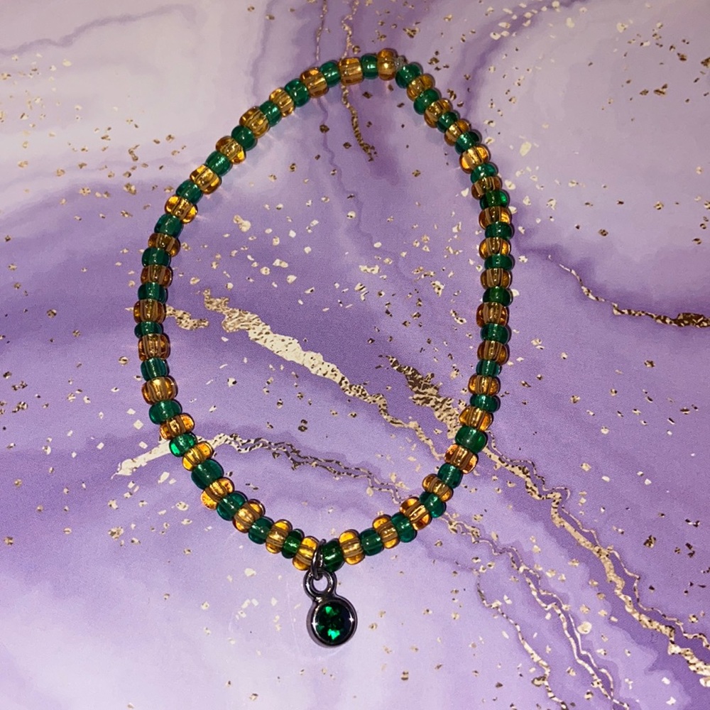 Handmade bracelet with green charm
